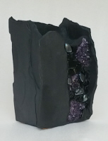 an 8 inch tall slate vase with amethyst crystals