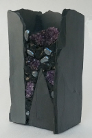 a 10 inch tall slate vase with amethyst