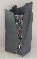 a 12 inch slate vase with amethyst and obsidian